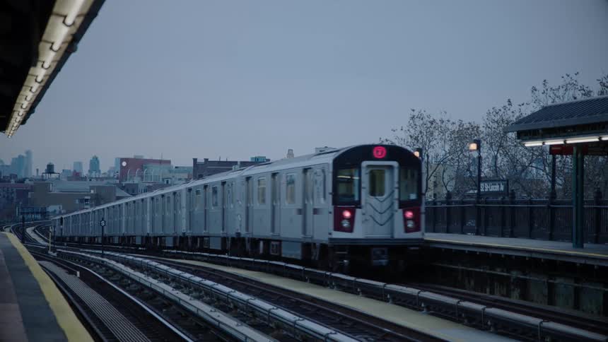 The train travels down the track
