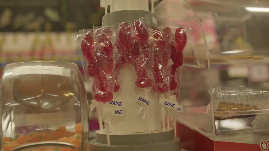 Lobster lollies wrapped in plastic on display in a shop in maine