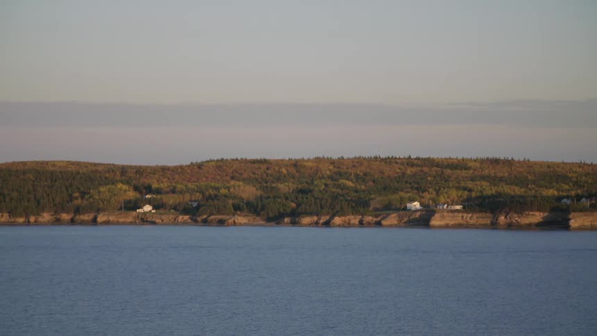 A landscape view of an ocean is displayed