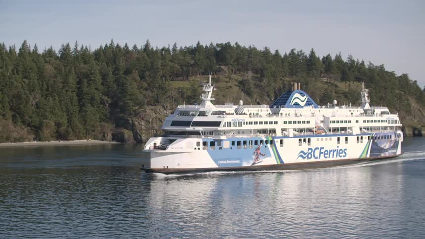 A ferry boat travels through the water