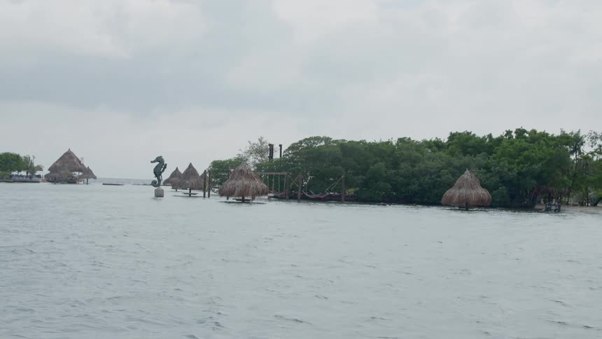 A beach resort sits partially under water