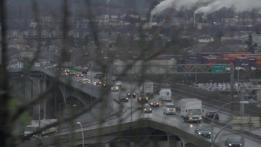 Traffic flows on an overpass at dusk