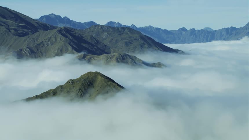 The mountain tops are above the clouds