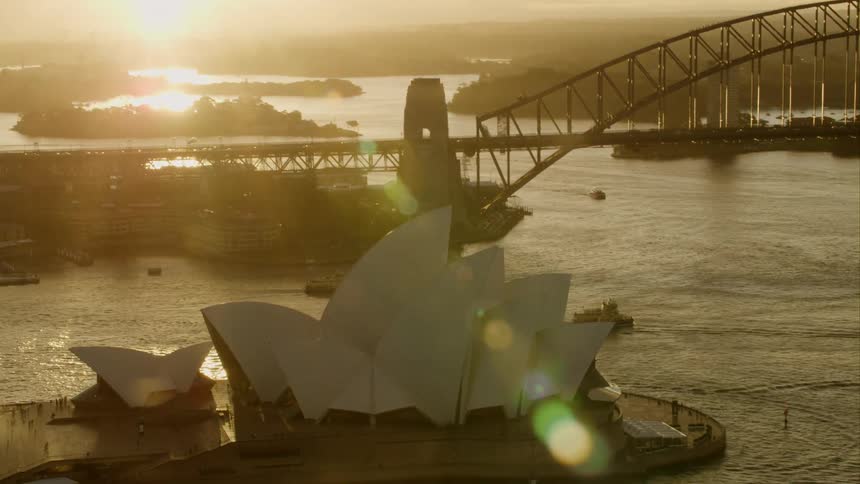 The opera house sits on the water