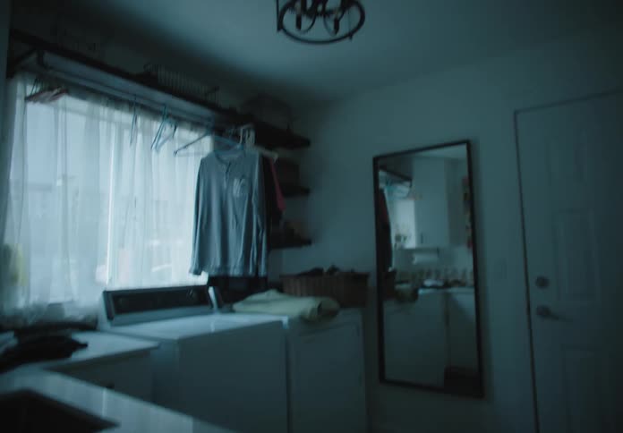 A washer and dryer in a laundry room