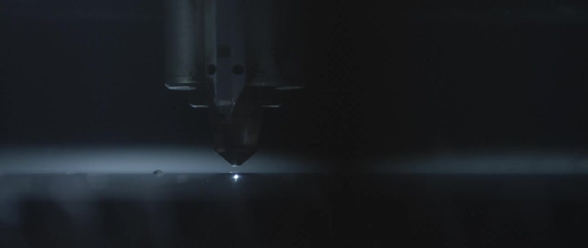 The machine cuts into the surface