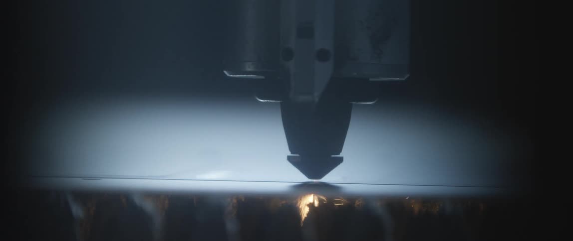Acetylene torch cutting through metal