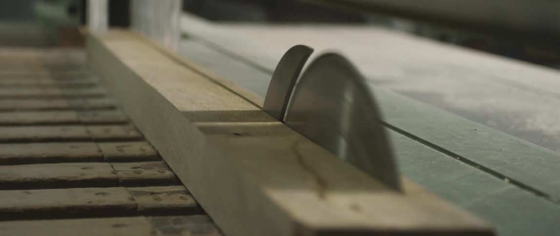 Table saw cuts through long narrow board