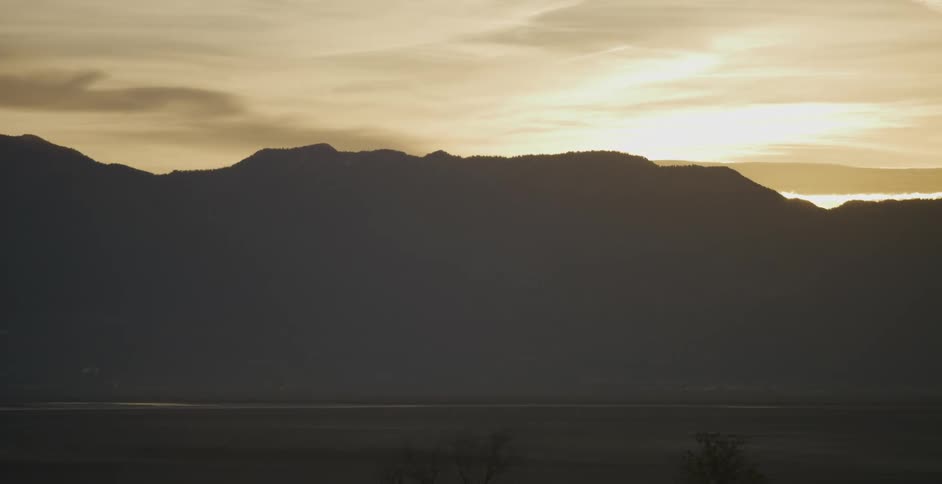 A mountain range rises in the distance