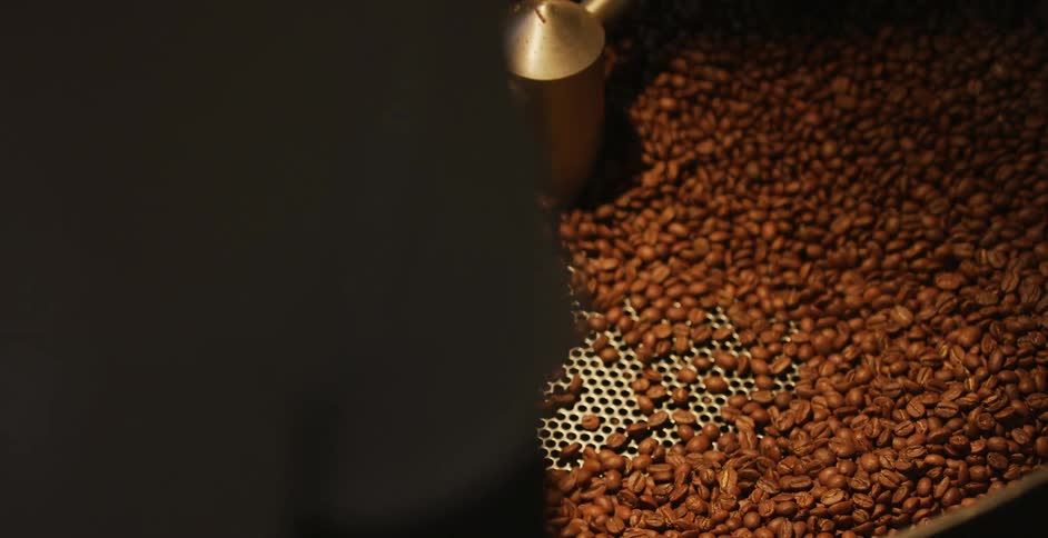 Coffee beans roasting in a rotary machine