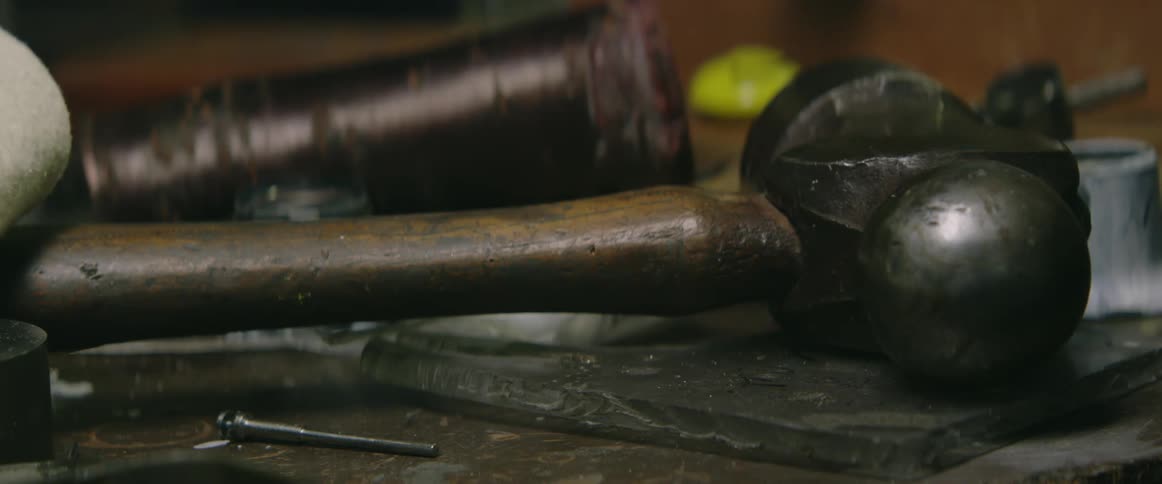 Hammer laying on workbench