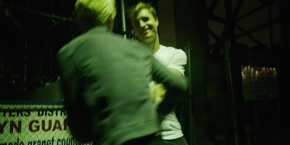 Two teenagers dance outside
