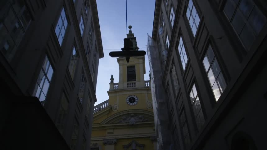 A clock tower in a city