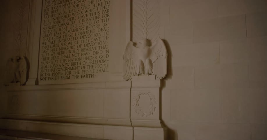 A marble monument with text