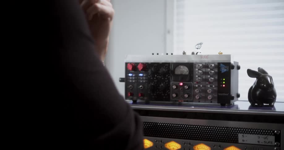 A man pushes a knob on the machine