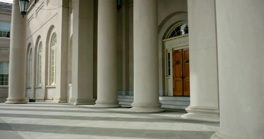 Large pillars frame the front of a building