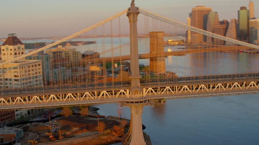 A bridge crossing in to a downtown area