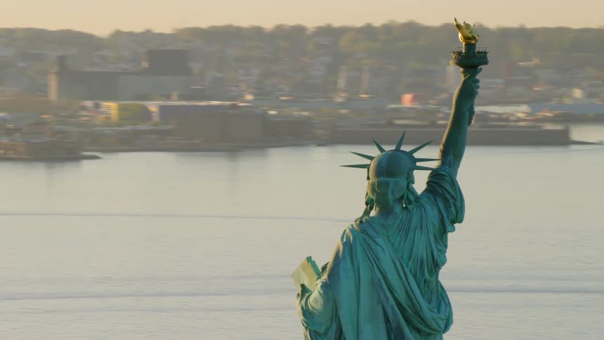 Aerial backside of statue of liberty in new york harbor