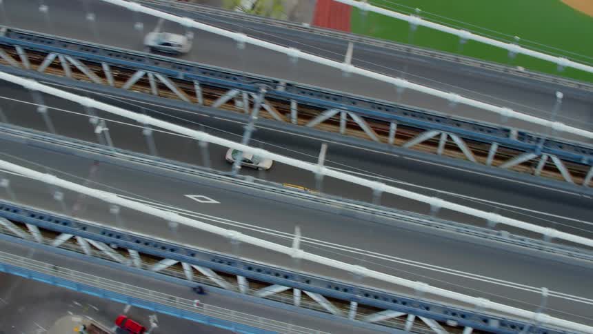 Cars driving across a bridge