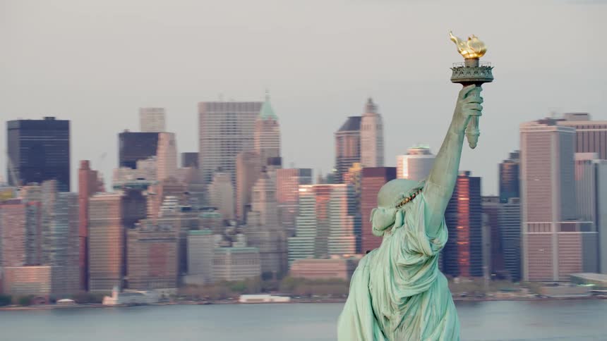 Aerial orbiting view of statue of liberty