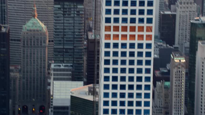 Aerial view of colorful new york skyscraper at sunset