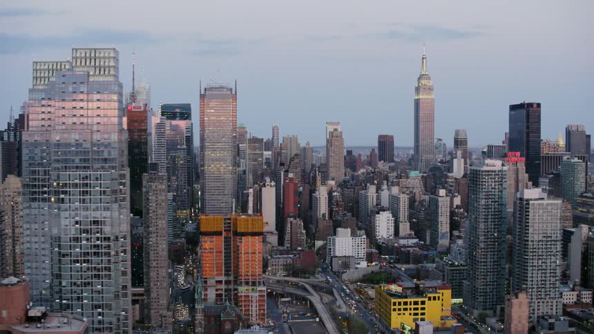 An aerial view of a downtown city is displayed
