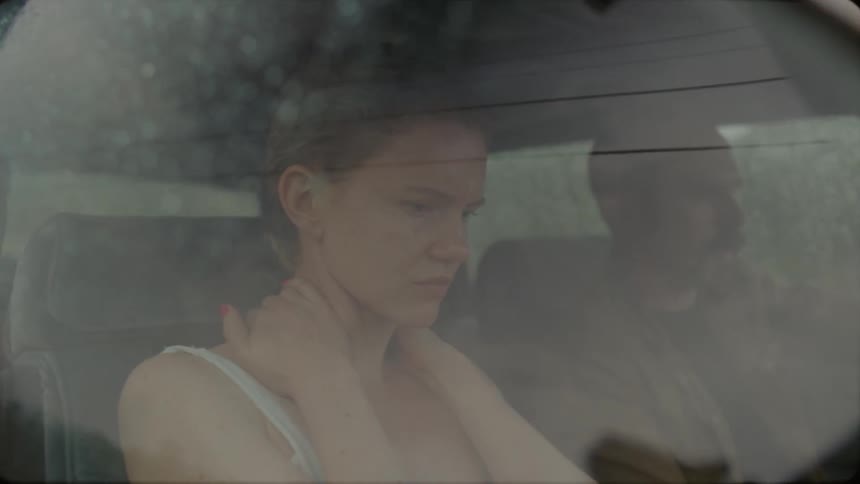 People talking in a car as they travel
