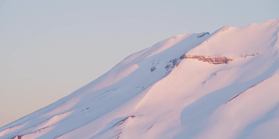 Snowy peaks at sunset