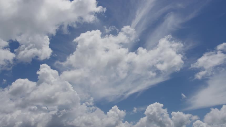 Beautiful blue sky with fluffy white clouds