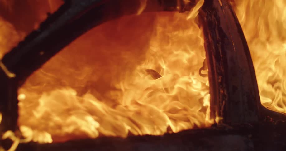 The vehicle is engulfed in flames