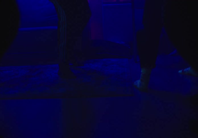 Peoples feet dancing in a party