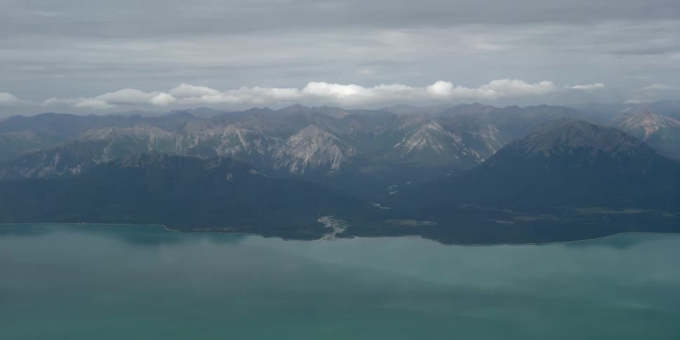 Clouds and gray sky over mountain peaks