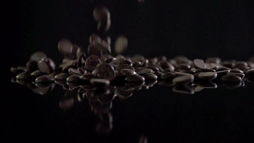 Chocolate chips falling for a photo shoot