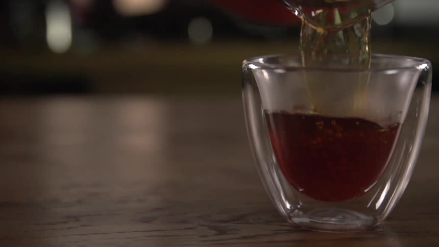 A beverage being poured in a studio