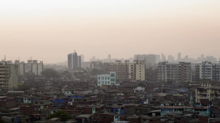 Third world city neighborhood at dusk