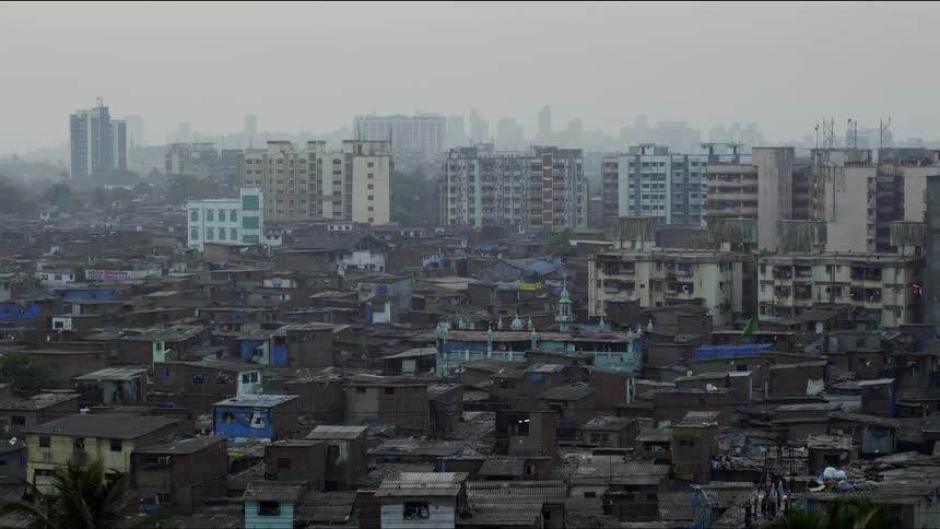 Smog obscures the skyline of a downtown city