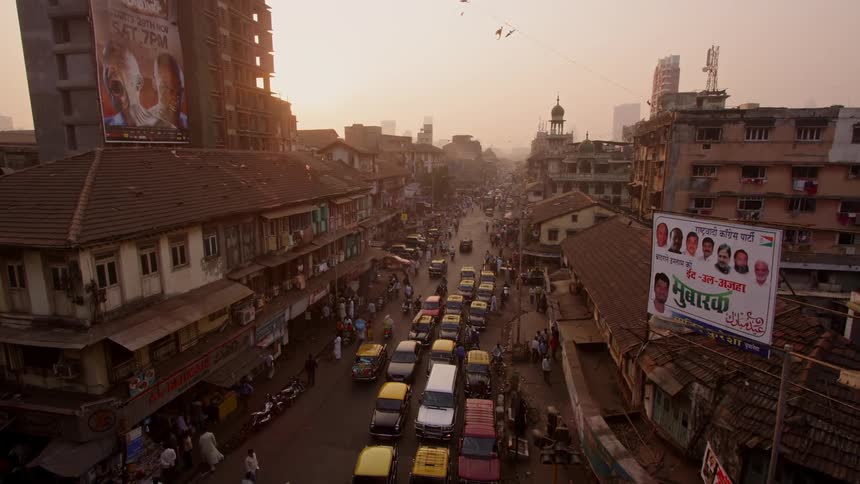 Cars and people on a city street