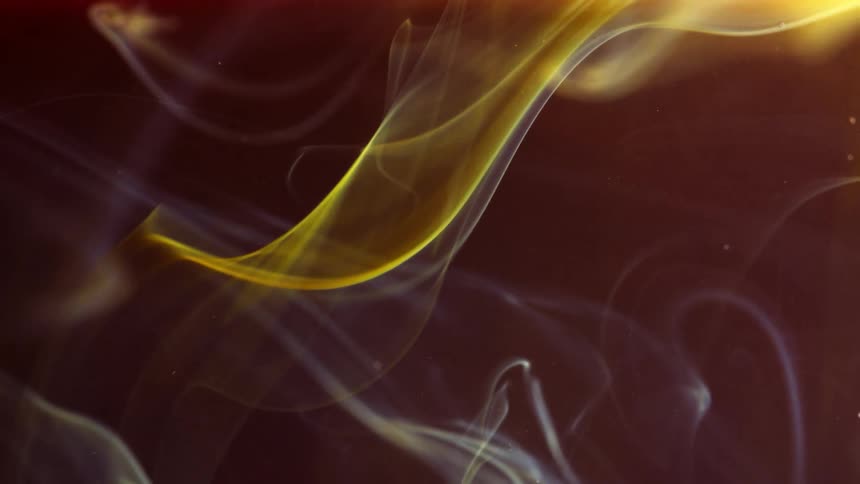 Different colored smoke swirls about