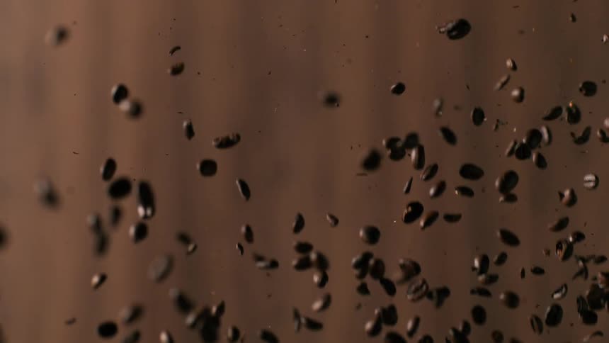 Coffee beans drop from above
