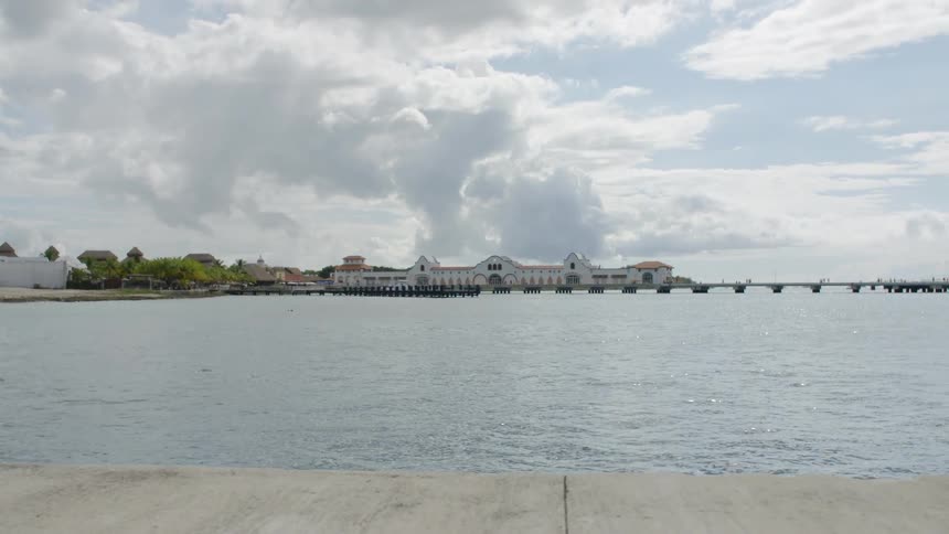 Buildings dock and bridge on coast