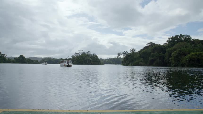 Pontoon boats on lake