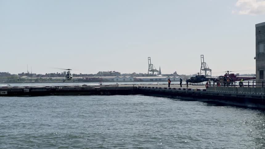 Helicopter lands on pier