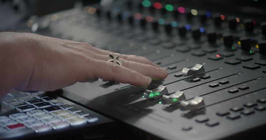 A man works in a recording studio