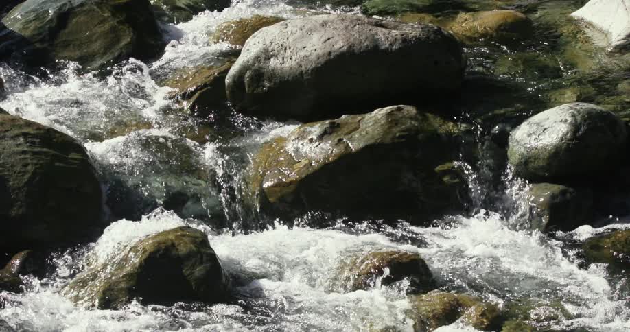 The water pours through the rocks
