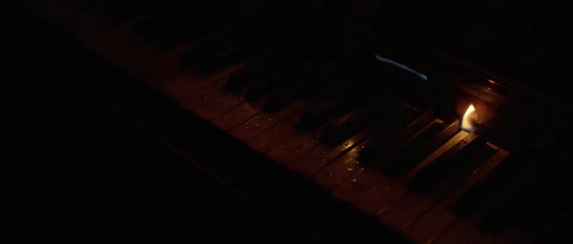 Flames on a piano