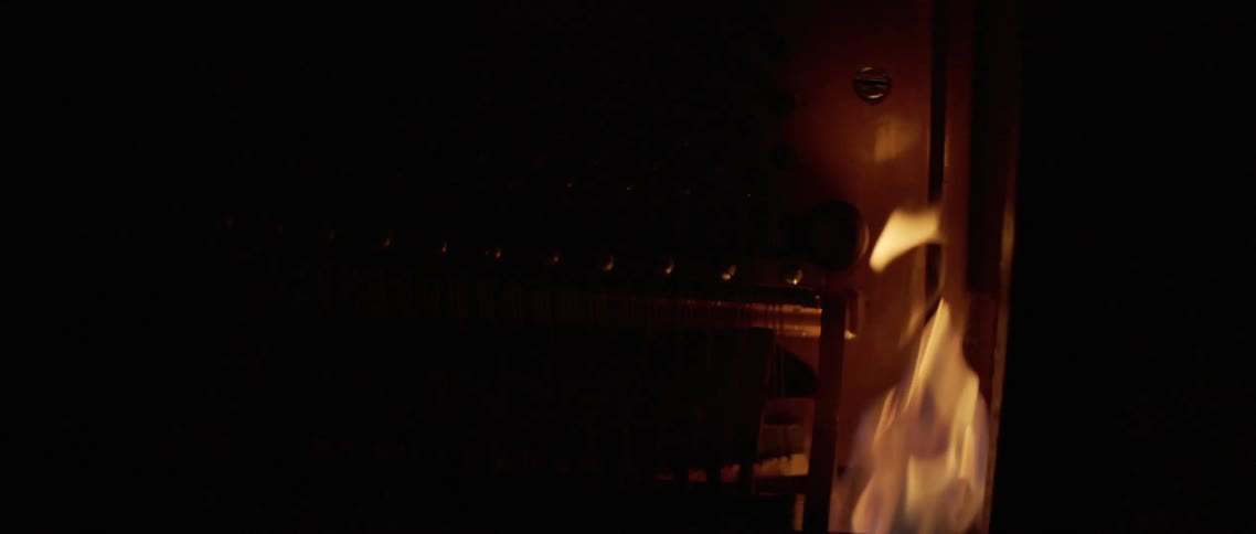 Flames on a burning piano