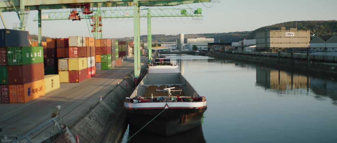 A dock with shipping containers