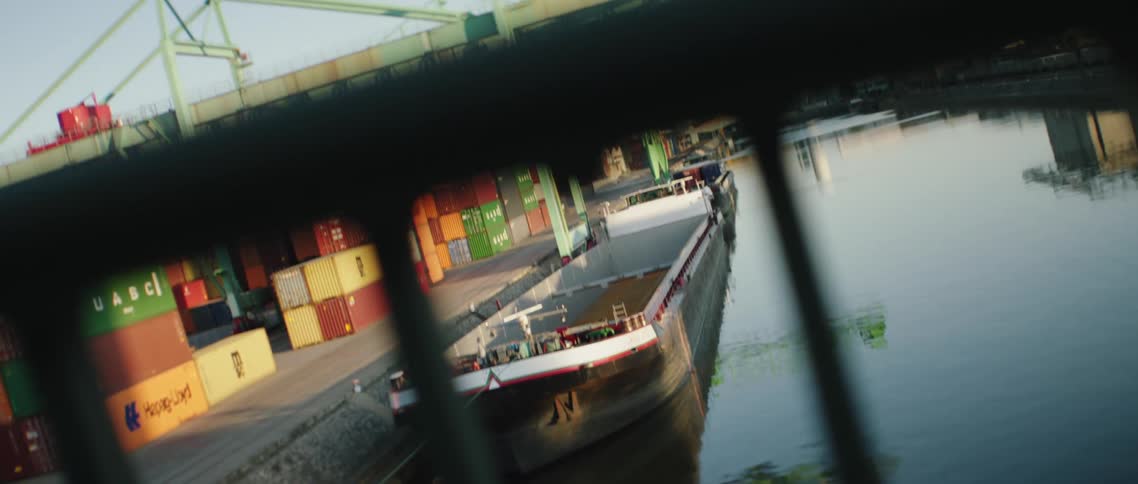 The containers sit on the ship