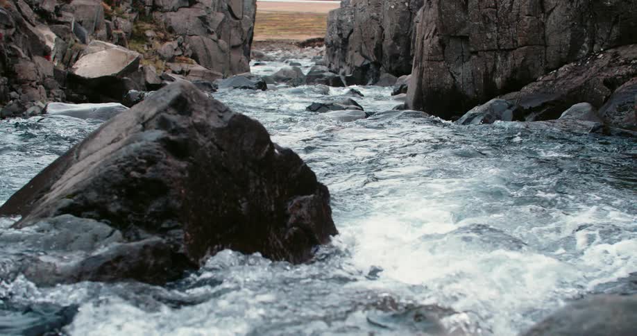 A river flowing between cliffs