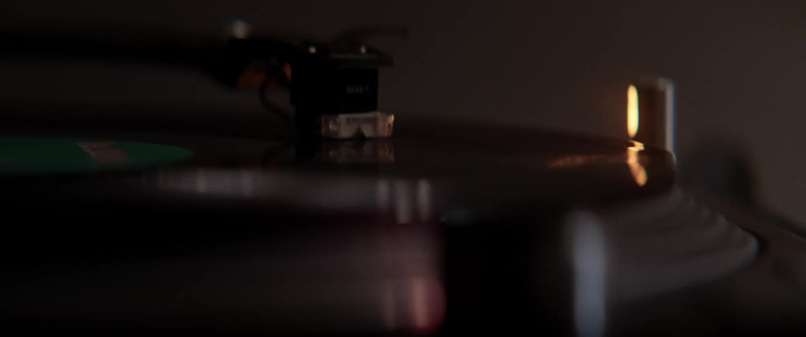 The record player plays